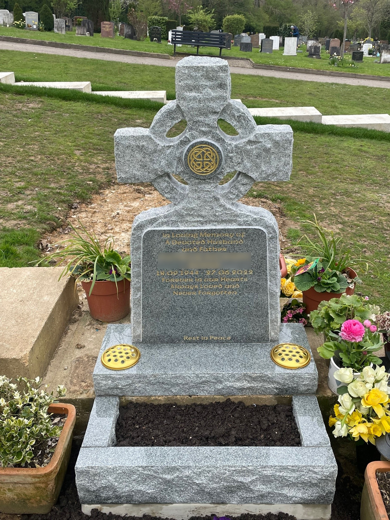 Karin Grey granite Celtic Cross with rustic finish and polished inscription panel and garden kerb set.